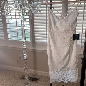 New elegant white flirty with desire body-con lace dress.